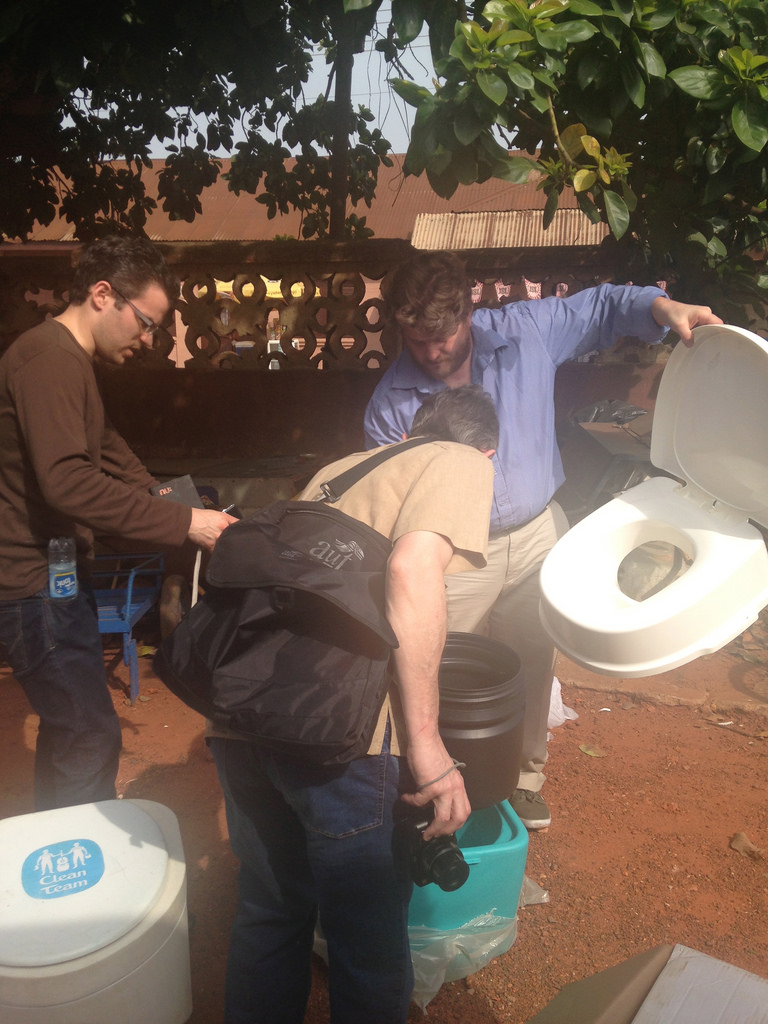 The Clean Team toilet is examined by the group